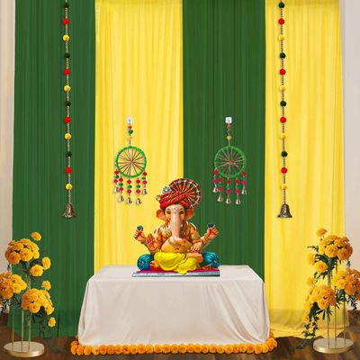 Green and Yellow Backdrop with Pom Pom Hangings for Haldi Mehndi | Party Propz