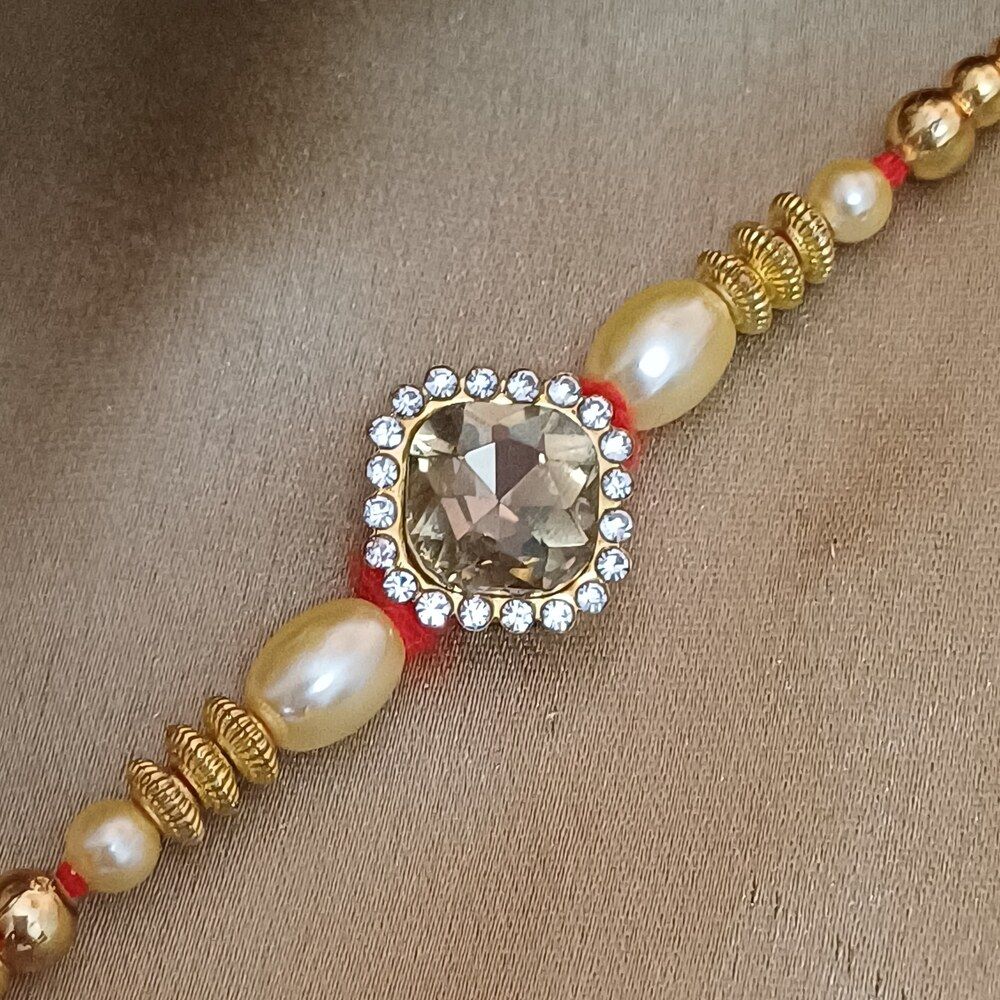 Gullak Gold Multicolour Crystal Rakhi - Elegant and Sparkling