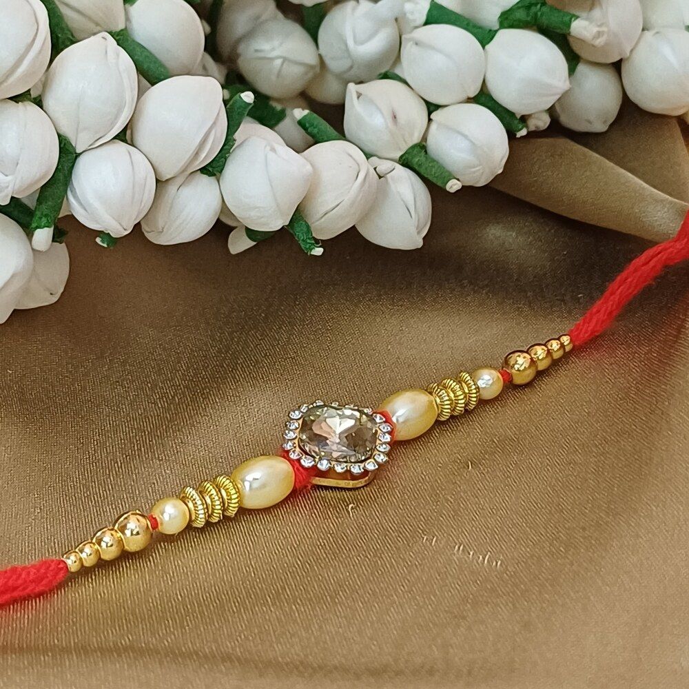 Gullak Gold Multicolour Crystal Rakhi - Elegant and Sparkling