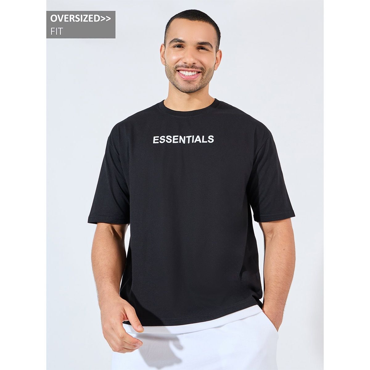 Styli Men's Oversized T-shirt with Essential Chest Print and Contrast Hem | Black - M