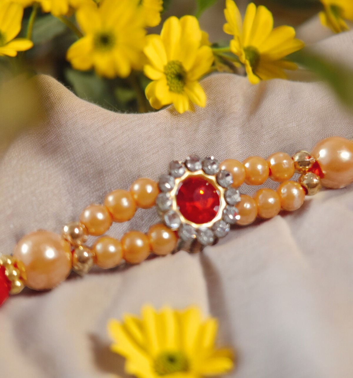 House Of Festivals Mauli Rakhi With Red Sparkling Stones & Moti