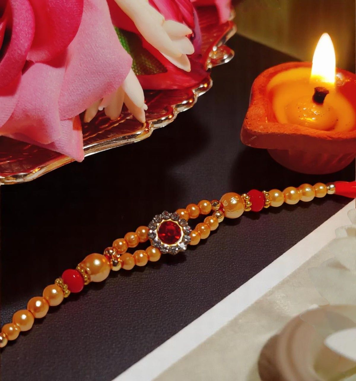 House Of Festivals Mauli Rakhi With Red Sparkling Stones & Moti