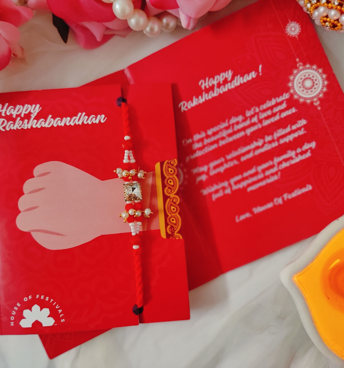 House Of Festivals Premium Sparkling Stone Rakhi with Intricate Moti Design - Elegant Craft