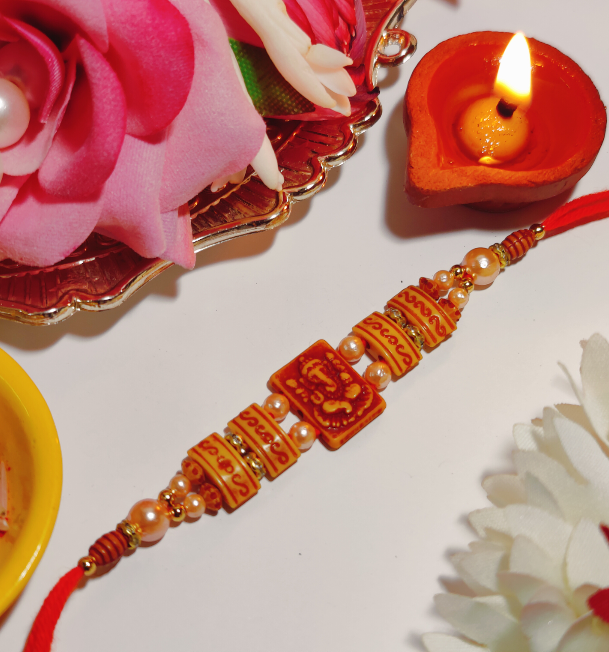 House of Festivals Ganesh Pendant Rakhi - Double Moti Dori