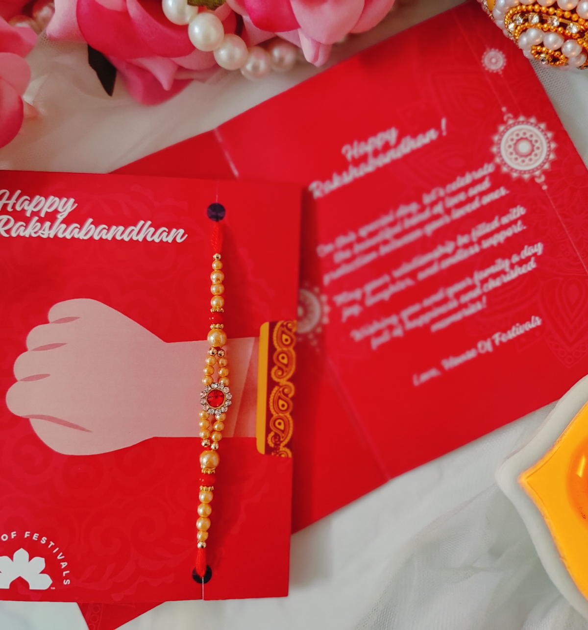 House Of Festivals Mauli Rakhi With Red Sparkling Stones & Moti