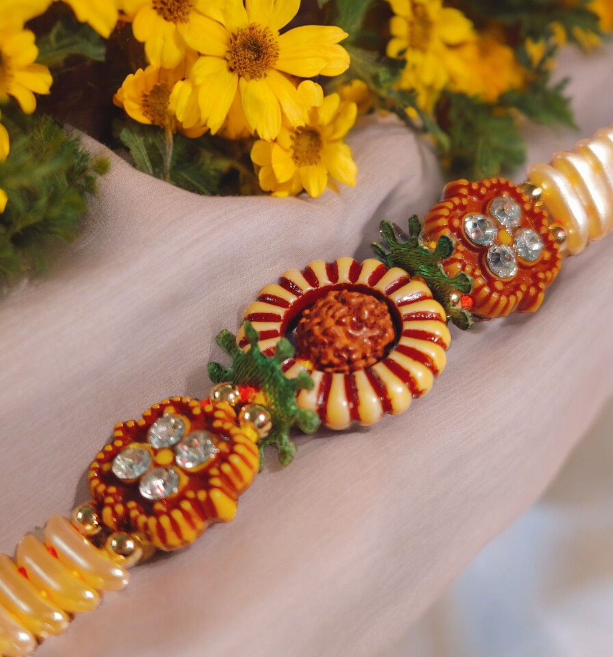 House Of Festivals Rudraksh Sun Design Rakhi with Sparkling Stones - Divine and Shiny