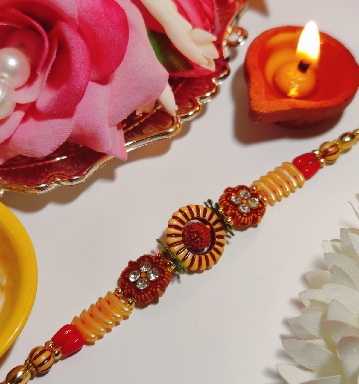 House Of Festivals Rudraksh Sun Design Rakhi with Sparkling Stones - Divine and Shiny