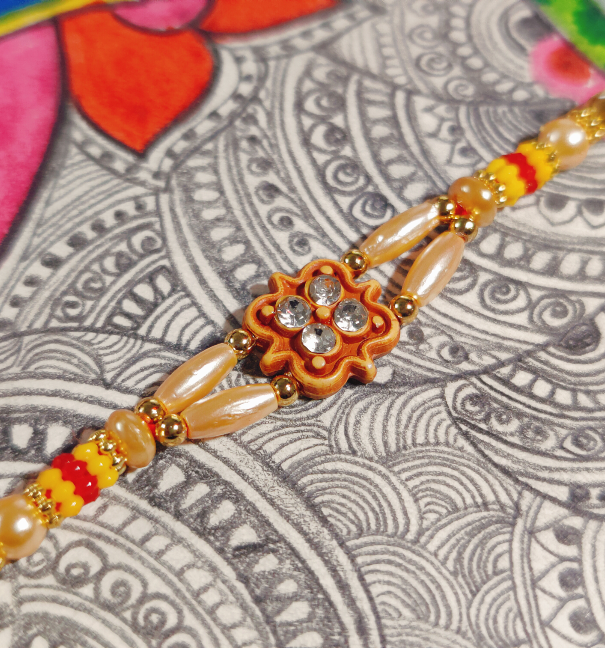 House Of Festivals Mauli Rakhi With Golden Moti - Elegant Design