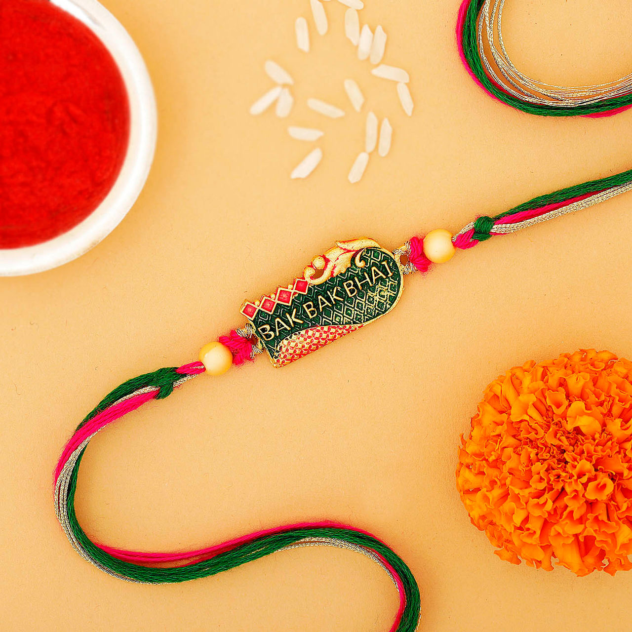 IGP Enamelled Pendant Rakhi - Simple and Elegant