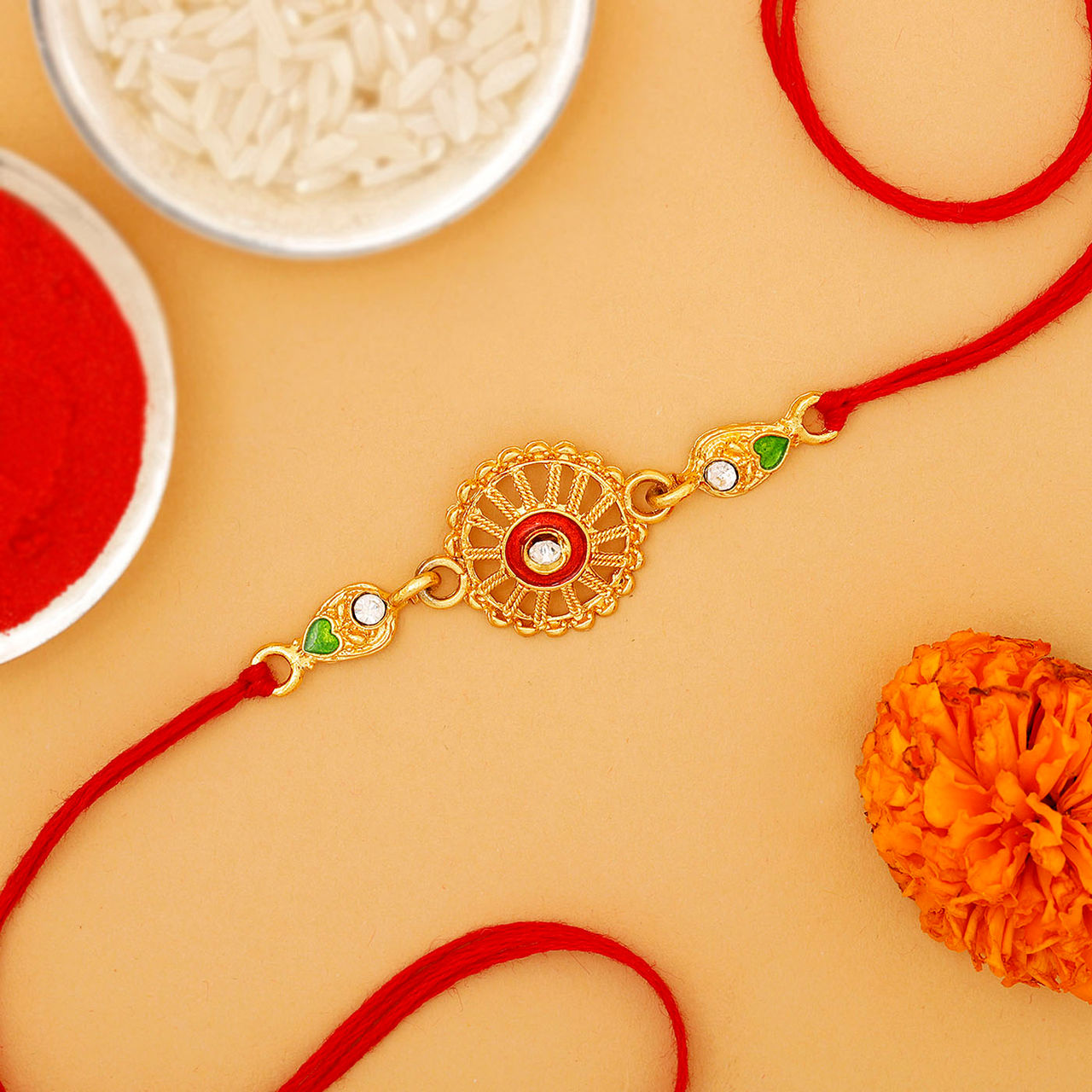 IGP Golden Chakra Rakhi - Ornate and Elegant