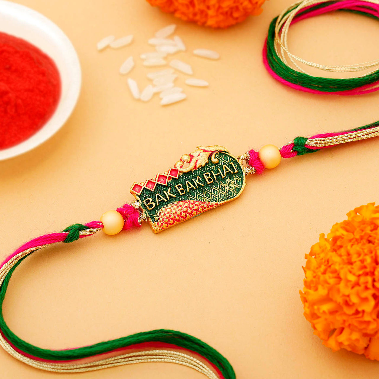 IGP Enamelled Pendant Rakhi - Simple and Elegant