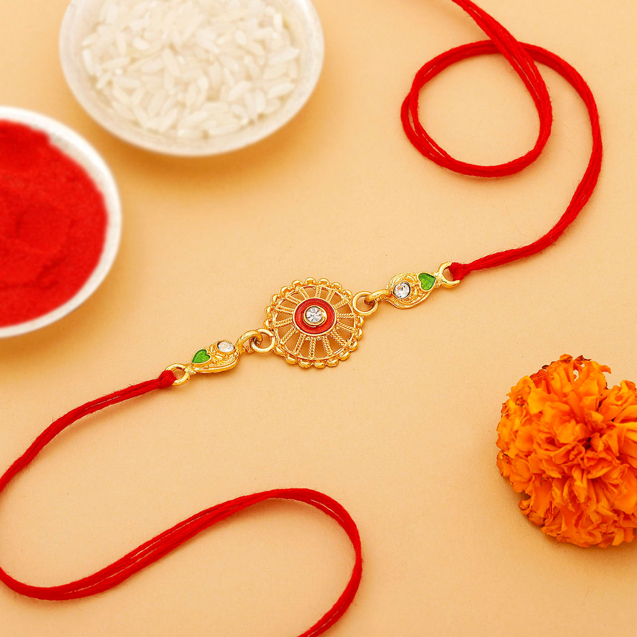 IGP Golden Chakra Rakhi - Ornate and Elegant