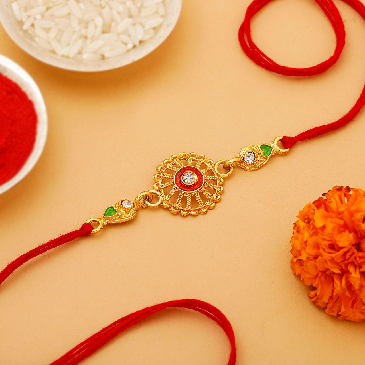 IGP Golden Chakra Rakhi - Ornate and Elegant