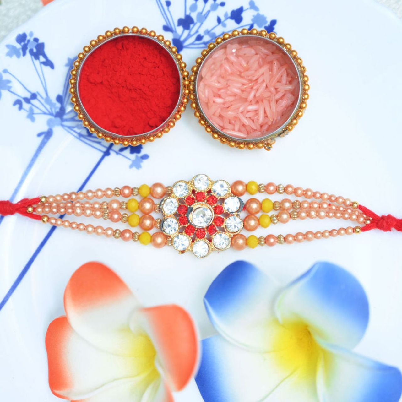 Daadi'S Kaju Katli 500G(500gms) & Aurum Diamond Rakhi With 3 Line Pearls(1pc) Combo