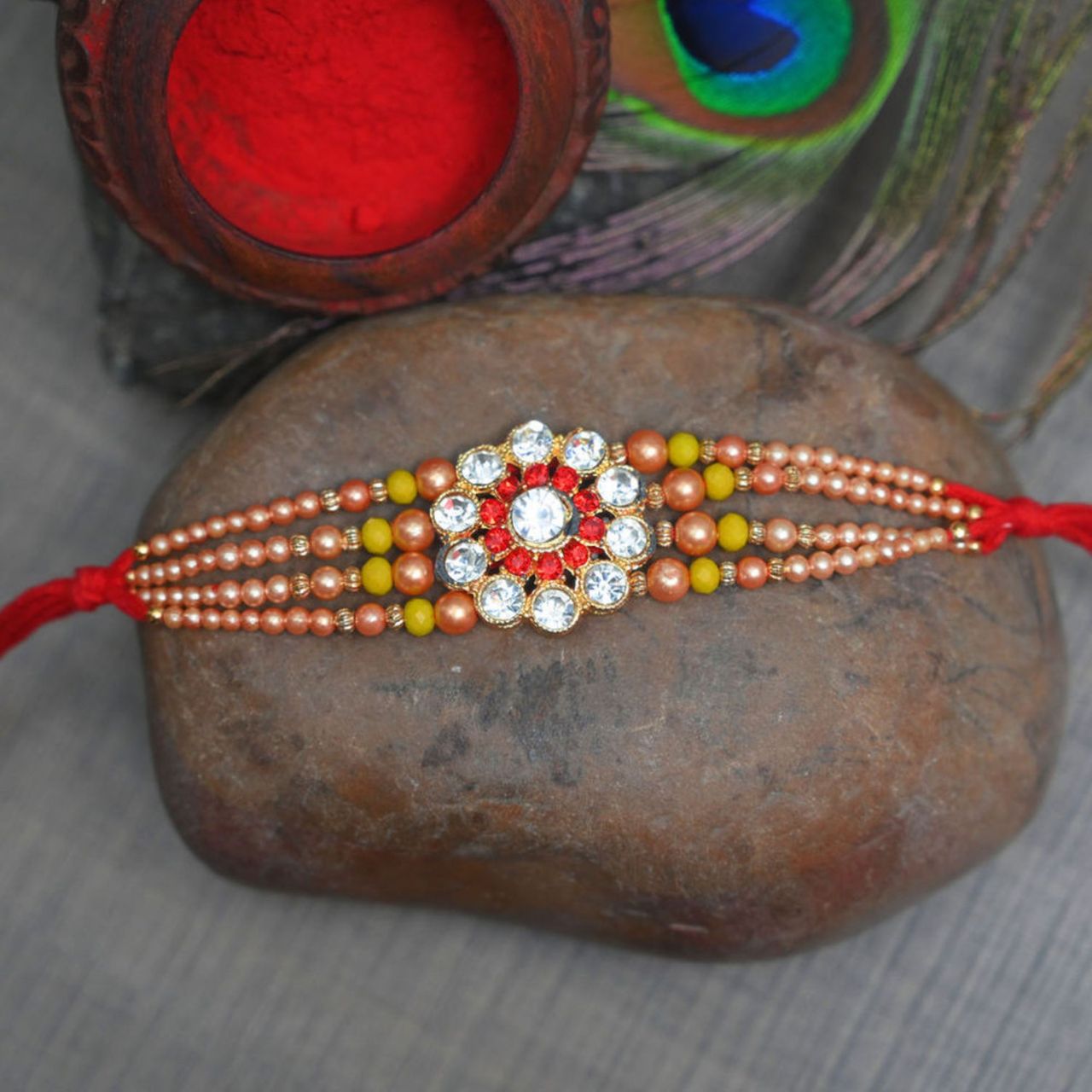 Daadi'S Kaju Katli 500G(500gms) & Aurum Diamond Rakhi With 3 Line Pearls(1pc) Combo