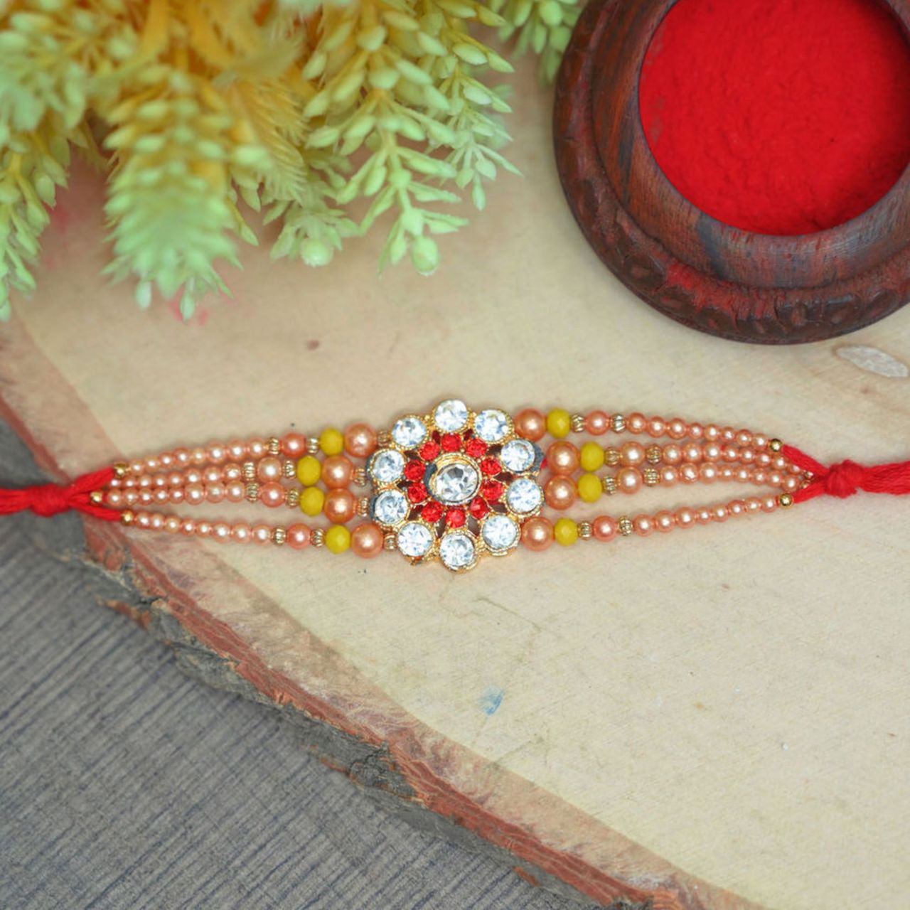 Daadi'S Kaju Katli 500G(500gms) & Aurum Diamond Rakhi With 3 Line Pearls(1pc) Combo