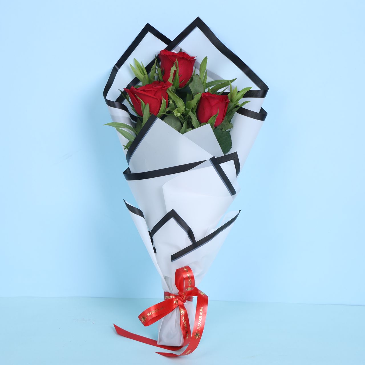 Floweraura Red Roses In White Paper (3pc) & Chocolate Mousse Cake (1pc) Combo