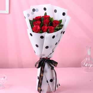 FlowerAura 8 Red Roses Bouquet in Polka Dot Wrap - Buy at ₹528