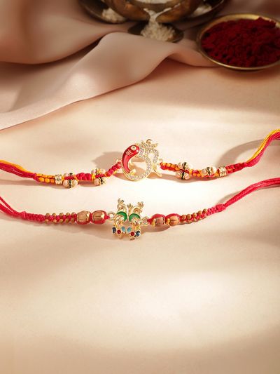 Rubans Gold Toned Set Of 2 Peacock And Om Motif Stone Studded Rakhi
