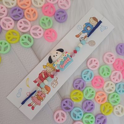 Gullak Puppy On Cake Blue White Kids Rakhi - Fun and Colorful