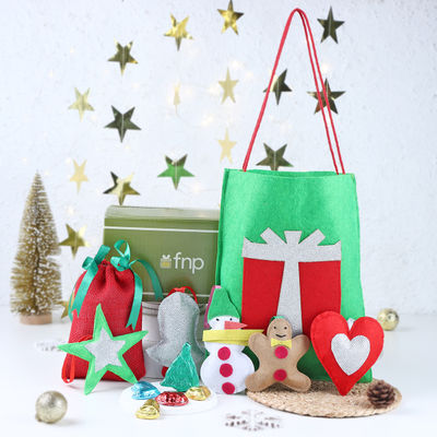 FNP Treasures Gift Ensemble | 1 Handbag + 1 Potli with Chocolate + 1 DIY Kit + 1 Reindeer Hanging)