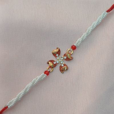 Gullak Swastik Minakari Moti Rakhi - Gold Metal