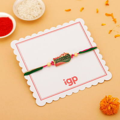 IGP Enamelled Pendant Rakhi - Simple and Elegant