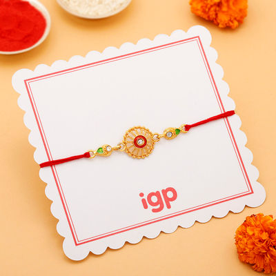 IGP Golden Chakra Rakhi - Ornate and Elegant