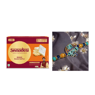 Unibic Swaadesi Shahi Kaju Katli Box(240gms) & Blue Shade Shree Krishna Metal Pendant Rakhi With Moti(1pc) Combo