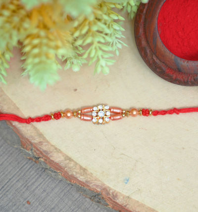 Aurum Small Diamond Rakhi With Multiple Beads - Elegant and Sparkling