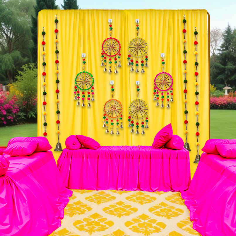 Yellow Backdrop Cloth with Pom Pom Hangings for Haldi Decoration | Party Propz