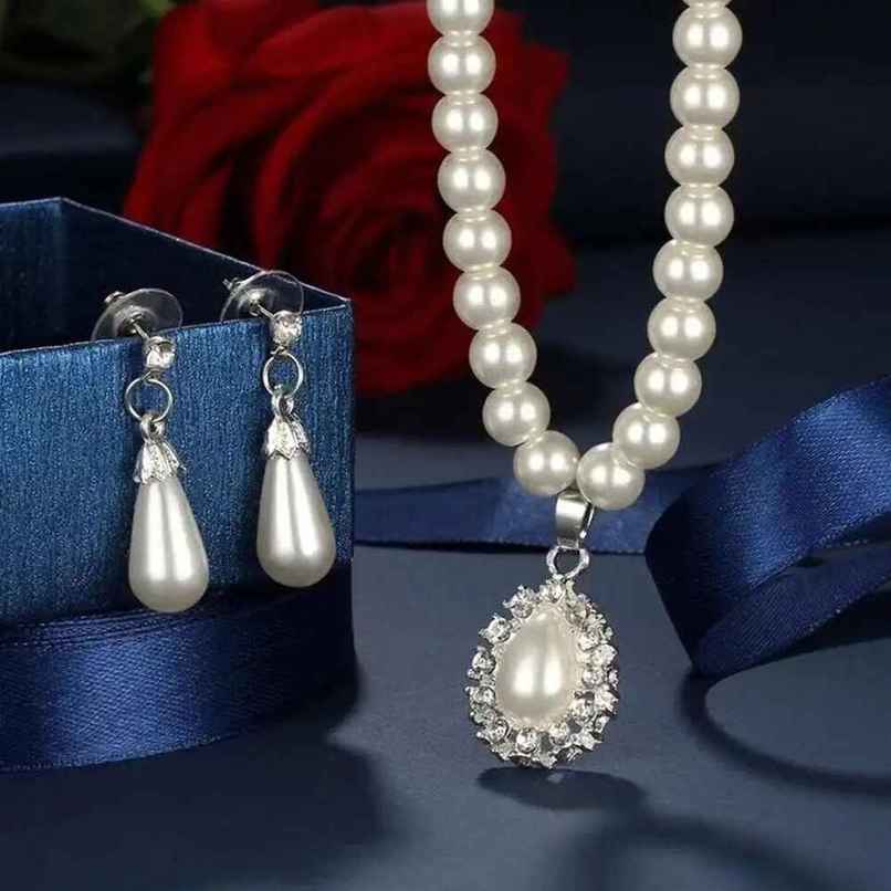 Shining Diva Fashion Latest Stylish Design Fancy Pearl Necklace Jewellery Set for Women | 15463s Shining Diva Fashion Latest Stylish Design Fancy Pearl Necklace Jewellery Set for Women | 15463s