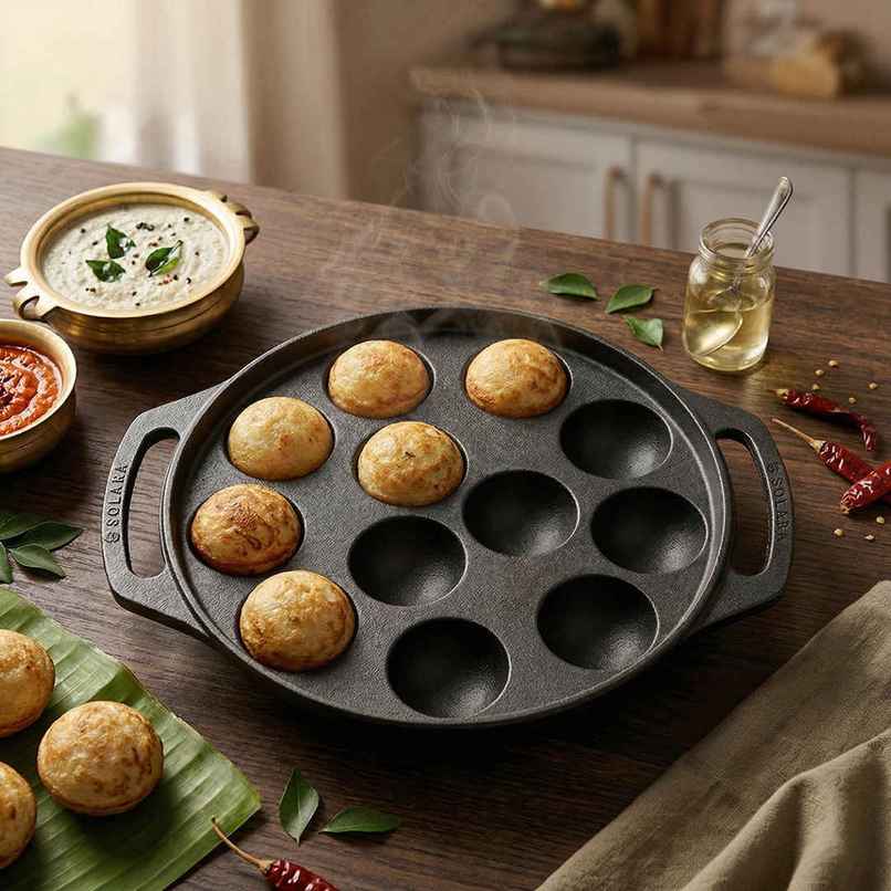 Solara Essentials Pre Seasoned 12 Cavity Cast Iron Paniyaram | 20 cm | Black Solara Essentials Pre Seasoned 12 Cavity Cast Iron Paniyaram | 20 cm | Black