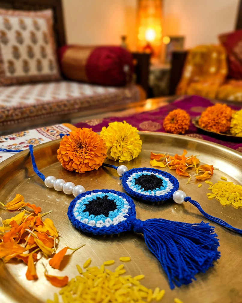 Kids Blue Evil Eye Crochet Rakhi | Mad Over Prints Kids Blue Evil Eye Crochet Rakhi | Mad Over Prints