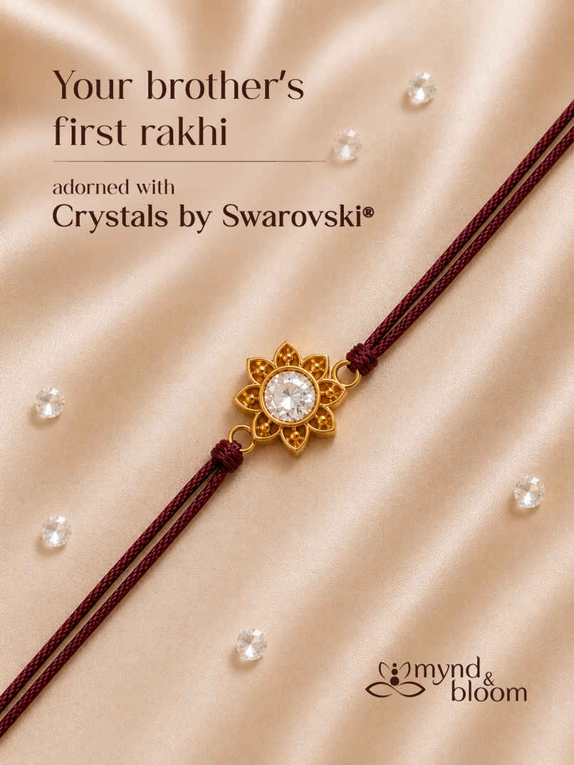 Created with Swarovski Crystals | Fleur de Lotus Rakhi | Carat Gold Plating Created with Swarovski Crystals | Fleur de Lotus Rakhi | Carat Gold Plating