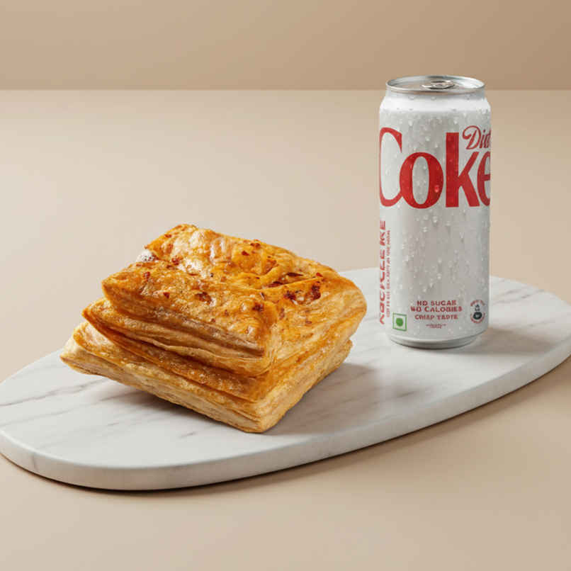 Veg Puff (1pc) & Coca-Cola Diet Coke Soft Drink Can | Low-Calorie & Fizzy (300ml) Combo Veg Puff (1pc) & Coca-Cola Diet Coke Soft Drink Can | Low-Calorie & Fizzy (300ml) Combo