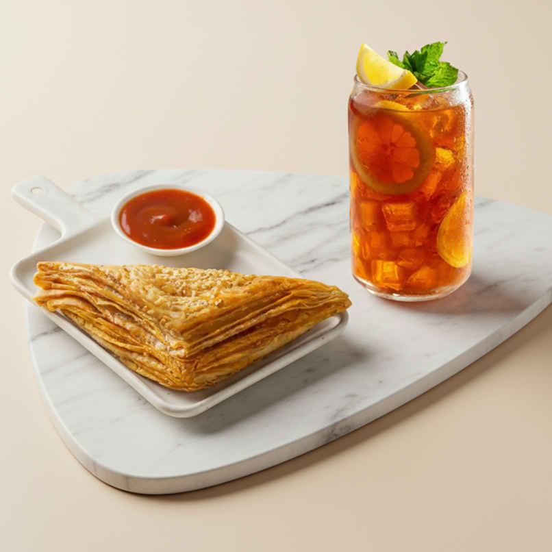 Chicken Puff (1pc) & 250Ml Lemon Iced Tea (1pc) Combo Chicken Puff (1pc) & 250Ml Lemon Iced Tea (1pc) Combo