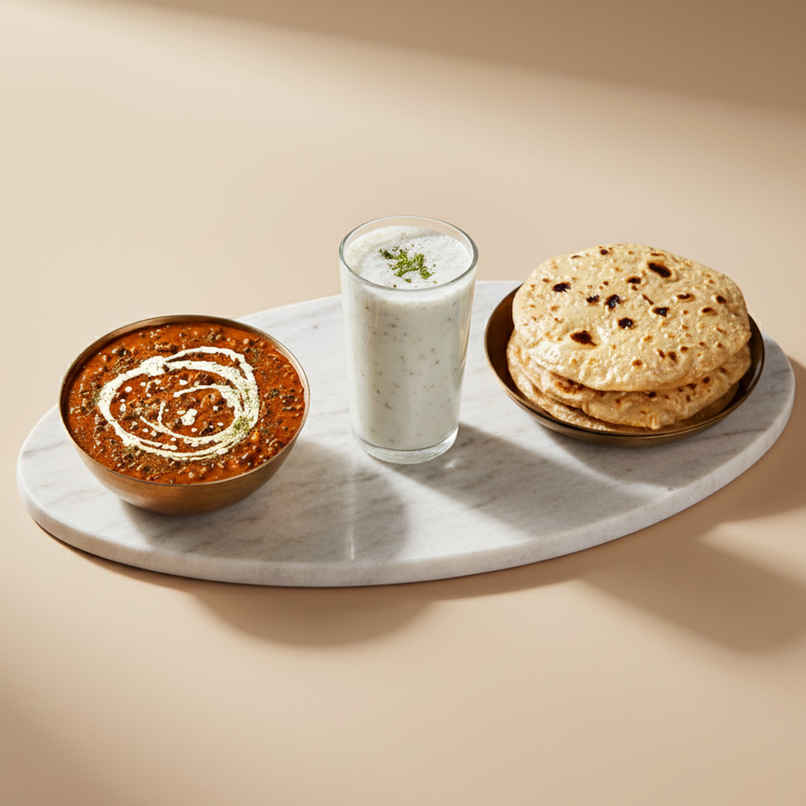 Dal Makhani & Chapati (1pc) & 250Ml Masala Chaas (1pc) Combo Dal Makhani & Chapati (1pc) & 250Ml Masala Chaas (1pc) Combo
