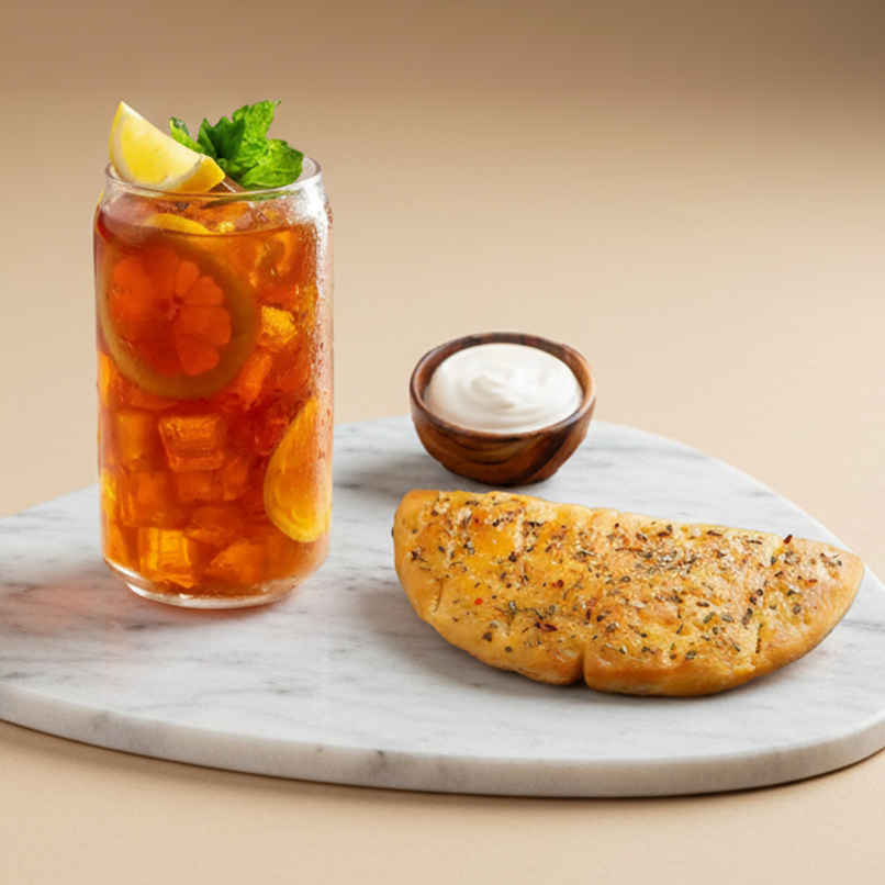 Garlic Bread With Cheese Dip (1pc) & 250Ml Lemon Iced Tea (1pc) Combo 