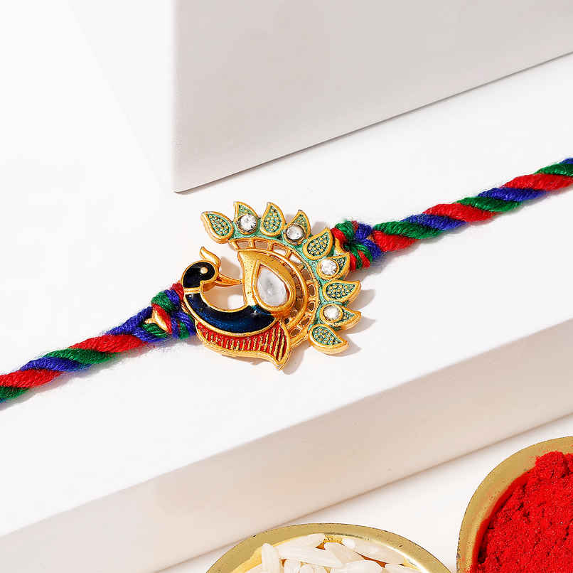 Elegant Stone Studded Peacock Rakhi | IGP Elegant Stone Studded Peacock Rakhi | IGP