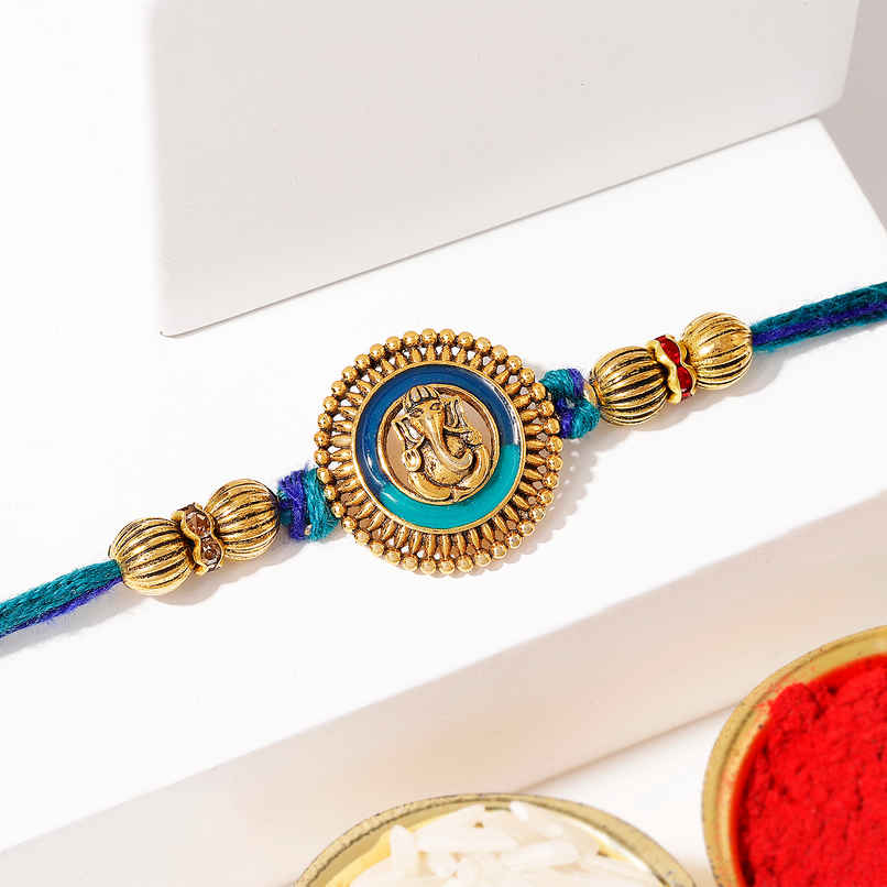 Devotional Ganesha Antique Dial Rakhi | IGP Devotional Ganesha Antique Dial Rakhi | IGP