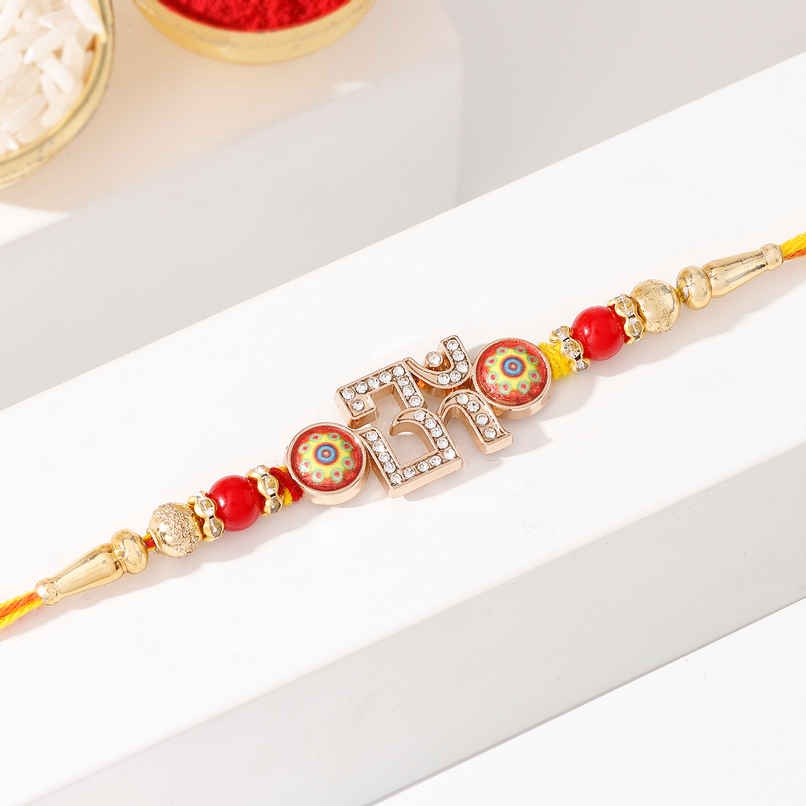 Crystal Studded Om Red & Golden Rakhi | IGP Crystal Studded Om Red & Golden Rakhi | IGP