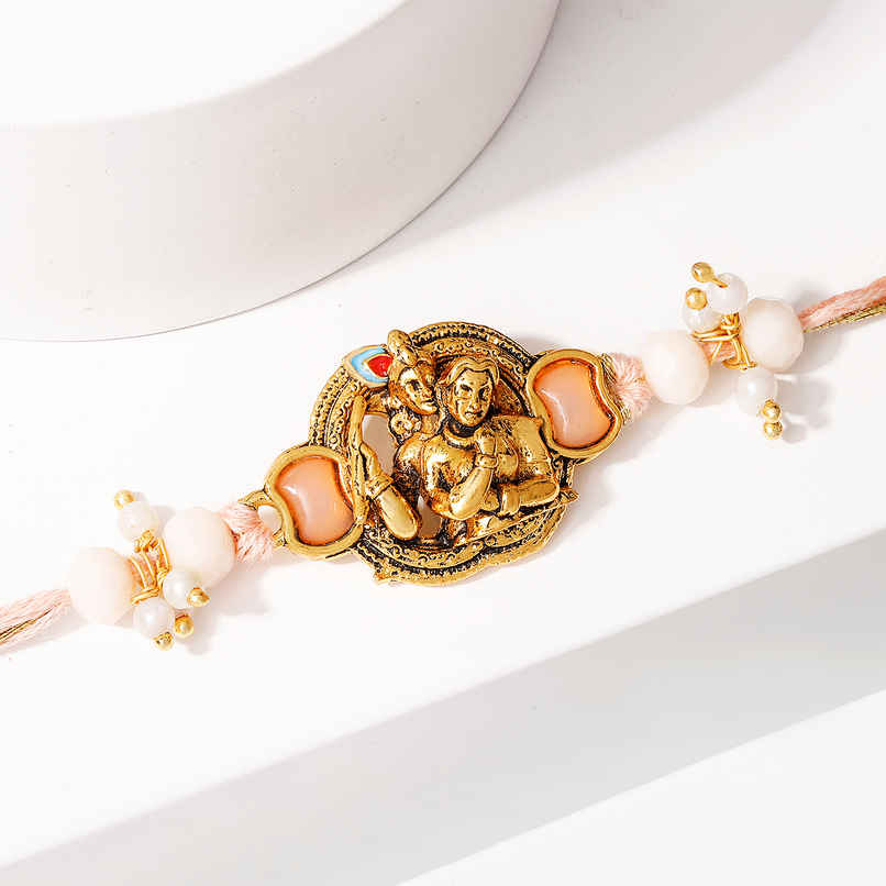 Krishna Devotional Pearl Thread Rakhi | IGP Krishna Devotional Pearl Thread Rakhi | IGP