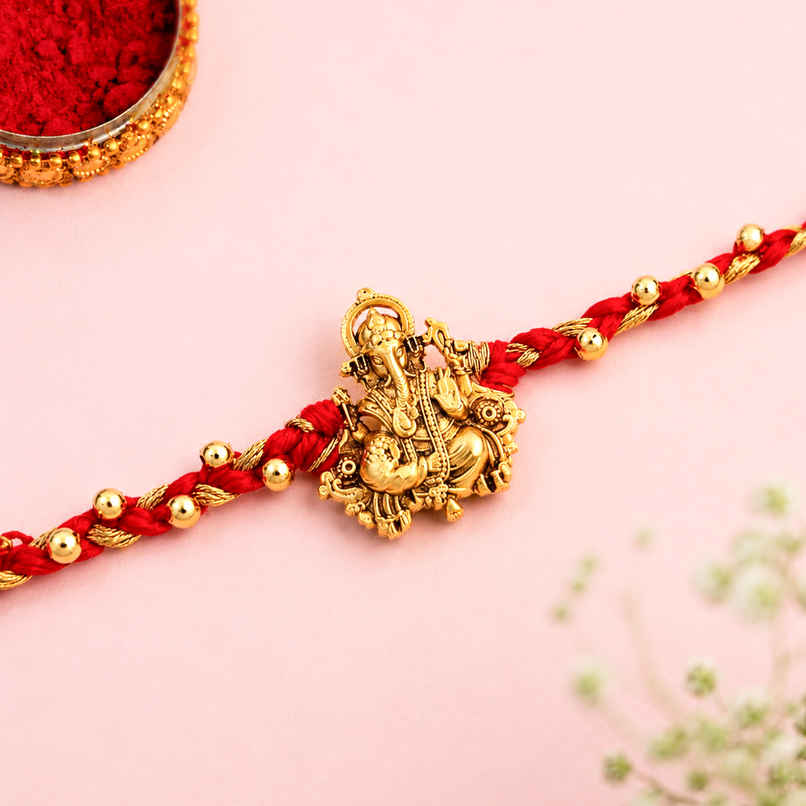 Rakhi for Brother | Divine Red Thread Ganesh | Religious | Pack of 1 |Included Roli Chawal | Voylla Rakhi for Brother | Divine Red Thread Ganesh | Religious | Pack of 1 |Included Roli Chawal | Voylla