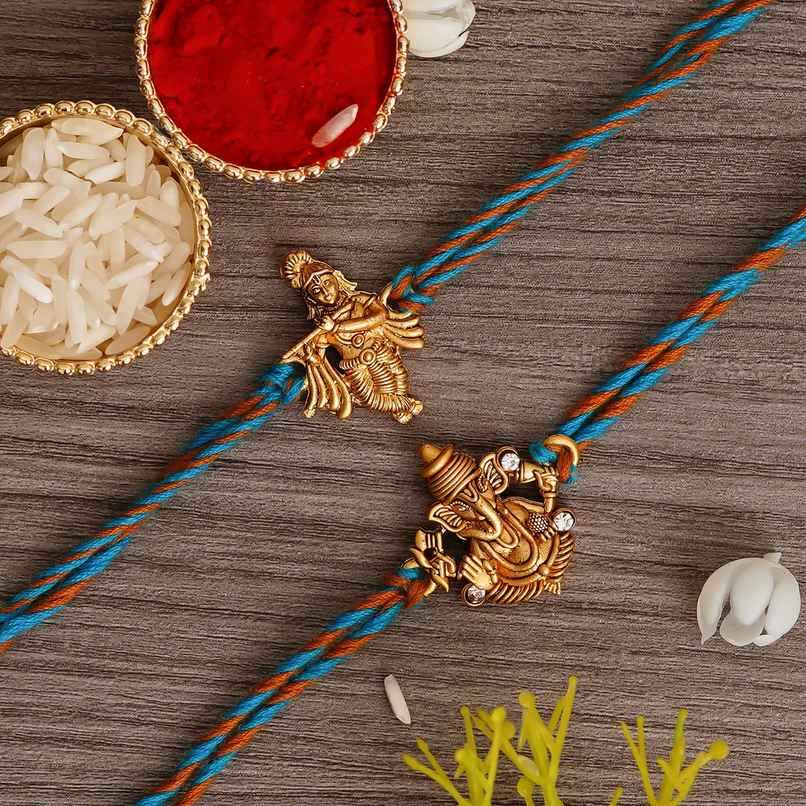 Religious Blue, Orange & Golden Rakhi | Krishna & Ganesha with Roli Chawal | Pack of 2 | Ecraftindia Religious Blue, Orange & Golden Rakhi | Krishna & Ganesha with Roli Chawal | Pack of 2 | Ecraftindia
