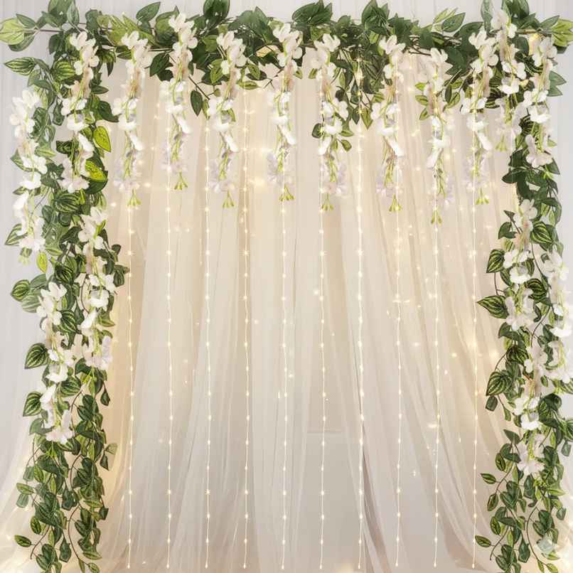 White Net Backdrop Curtain with Wisteria Decoration for Wedding Festival | Party Propz White Net Backdrop Curtain with Wisteria Decoration for Wedding Festival | Party Propz