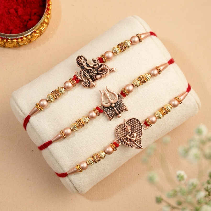 Rakhi for Brother | Trishul, Damru, Lord Ganesha & Lord Krishna Flute | Religious | Includes Roli Chawal | Pack of 3 | Ecraftindia Rakhi for Brother | Trishul, Damru, Lord Ganesha & Lord Krishna Flute | Religious | Includes Roli Chawal | Pack of 3 | Ecraftindia