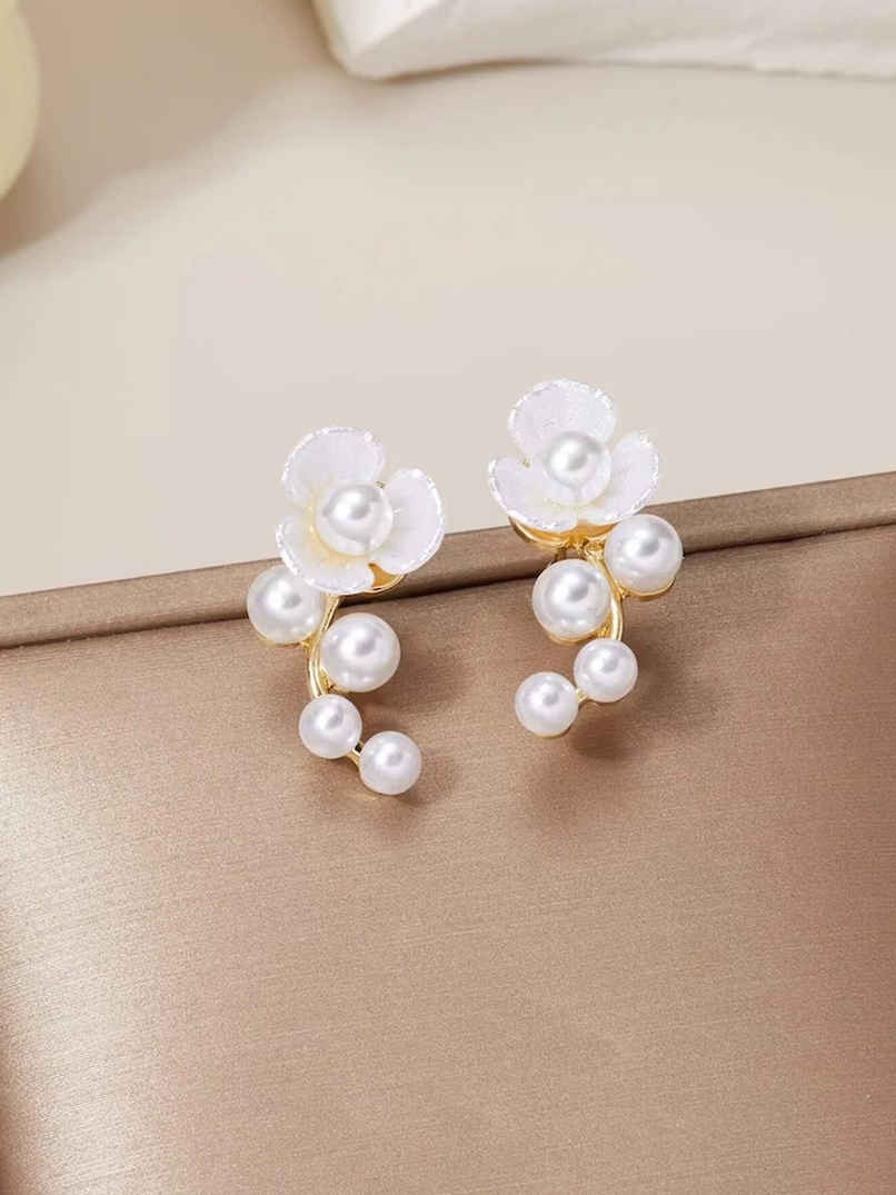 Unwind by Yellow Chimes Gold Plated White Pearl Stud Earrings