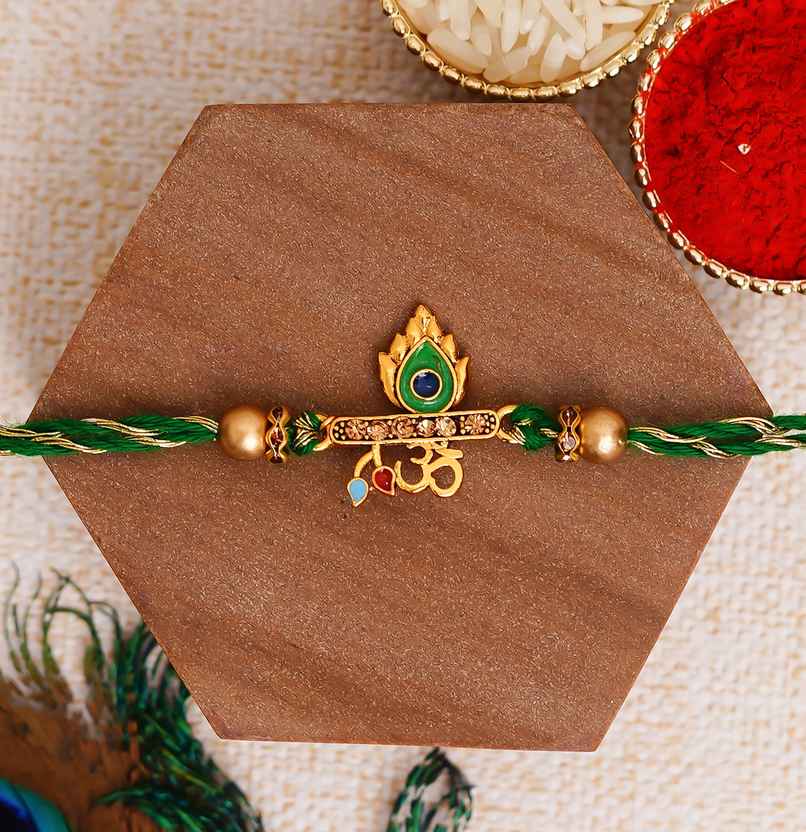 Green Golden Peacock Feather Om Designer Rakhi with Roli Chawal Rakhi for Brother Bhaiya Bhai | Pack of 1 | Ecraftindia Green Golden Peacock Feather Om Designer Rakhi with Roli Chawal Rakhi for Brother Bhaiya Bhai | Pack of 1 | Ecraftindia