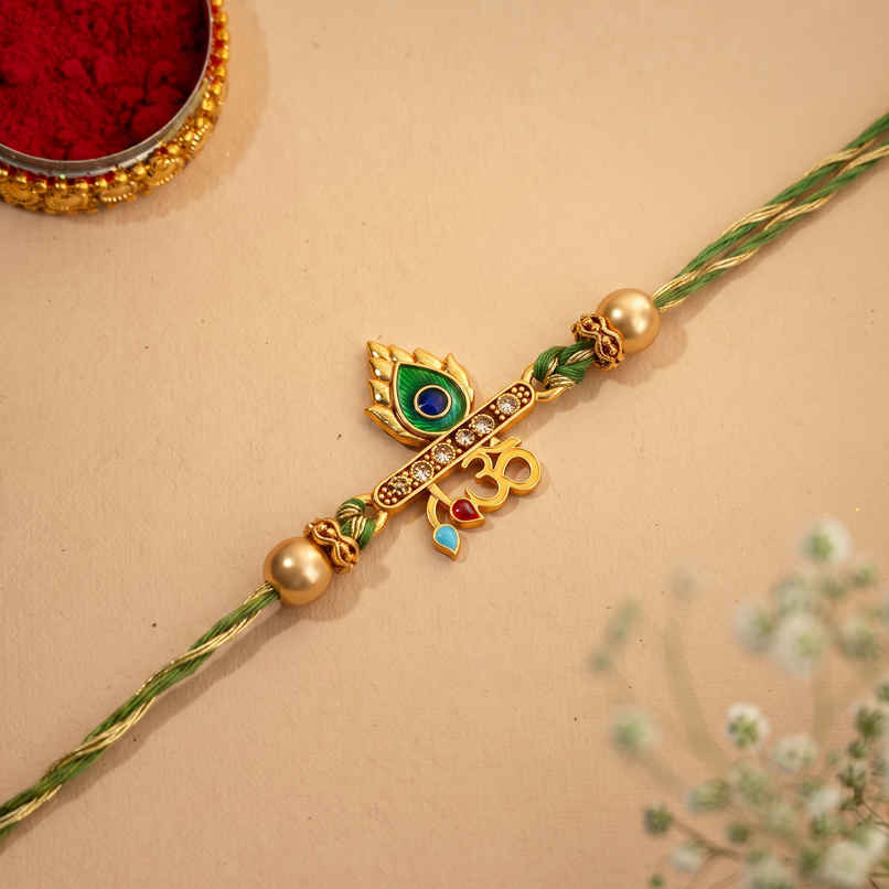 Green Golden Peacock Feather Om Designer Rakhi with Roli Chawal Pack Rakhi for Brother Bhaiya Bhai | Ecraftindia Green Golden Peacock Feather Om Designer Rakhi with Roli Chawal Pack Rakhi for Brother Bhaiya Bhai | Ecraftindia